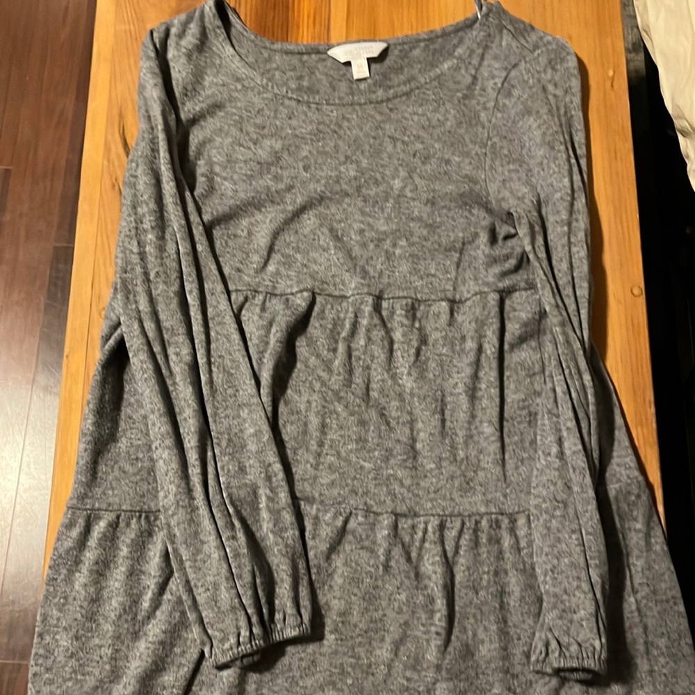 Lauren Conrad long sleeve. Good condition. Small hole on side of shirt.